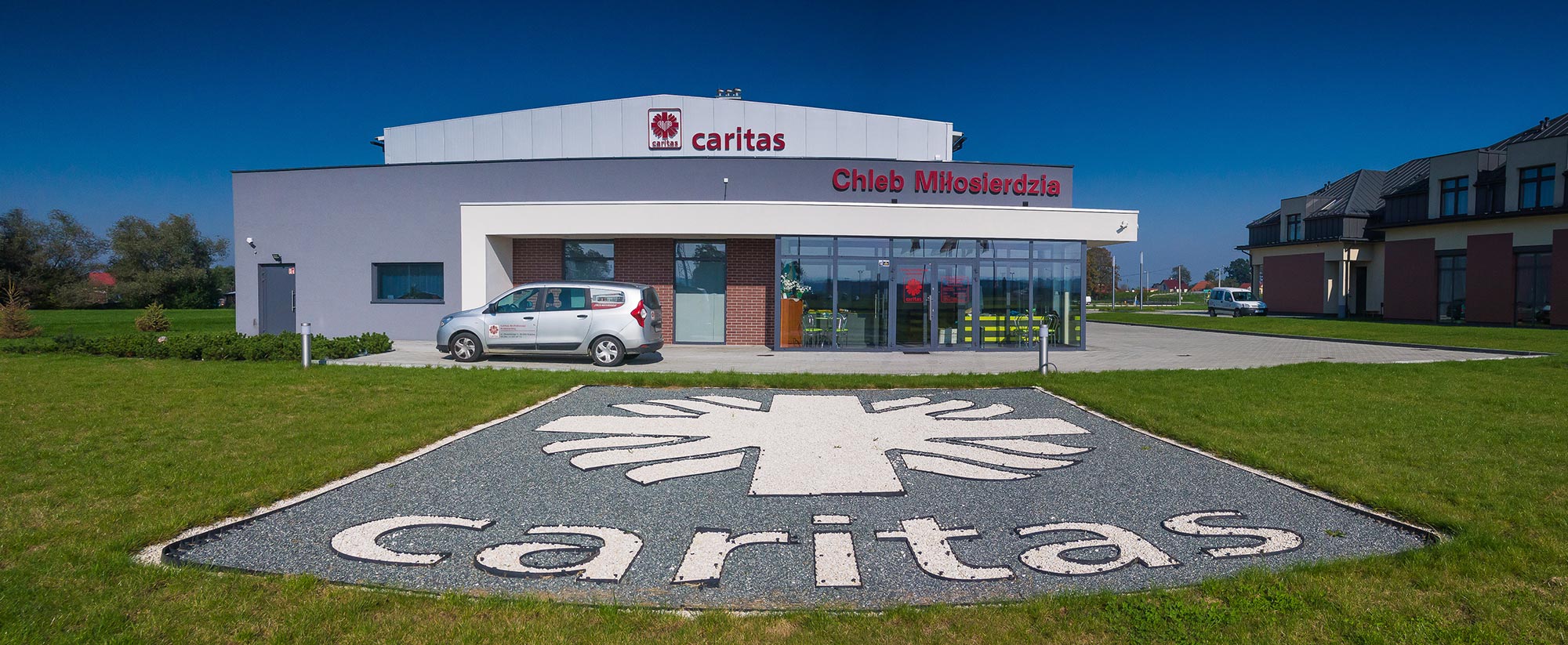 Hala stalowa z budynkiem biurowym dla CARITAS w Brzegach